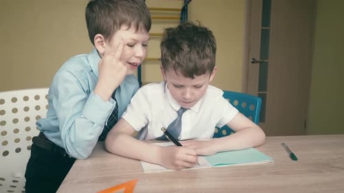 Pupils Do Homework, Write Numbers in Notebooks, Help Each Other, on the Tables Are School Things.