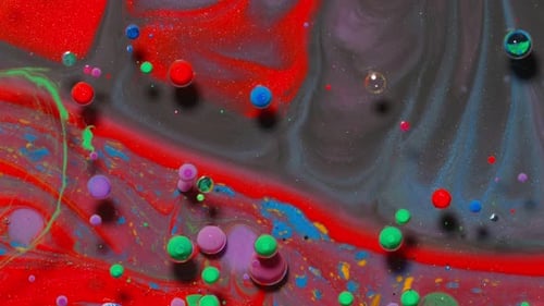 Brightly Colored Paint Mixing Together