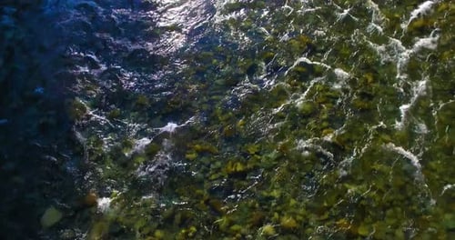 Low Altitude Flight Over Fresh Fast Mountain River with Rocks at Sunny Summer Morning