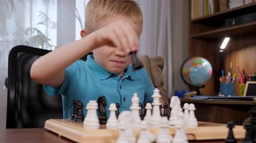 Angry Little Boy Plays Chess He Beats the King and Finishes the Chess Game