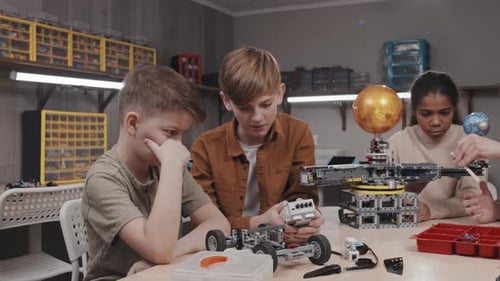 Kids Working On Robots