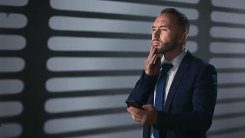 Upset Business Man Frowning Financial Problem Company Bankruptcy at Night Office Jalousie Shadow