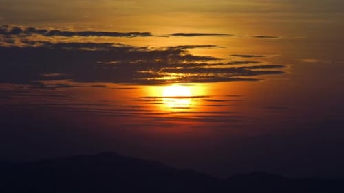 Vibrant Sunrise Over Mountain Landscape