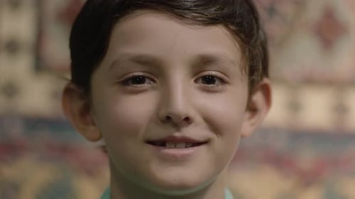 Smiling Child Portrait Close-Up Indoors