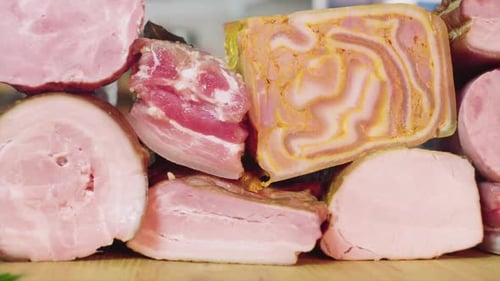 Various Cured Meat Cuts on Wooden Cutting Board