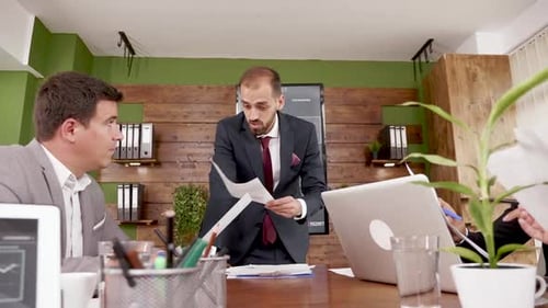 Serious Business Meeting in Modern Office Conference Room