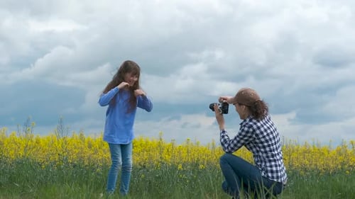 Girl Posing for Pictures in a Wildflower Field