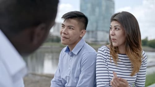 Friends Talking Together Outdoors in the City