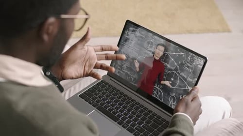 Adult Learning Online With Laptop at Home