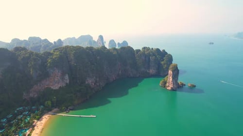 4K aerial view of the beautiful mountain coast of the tropical sea