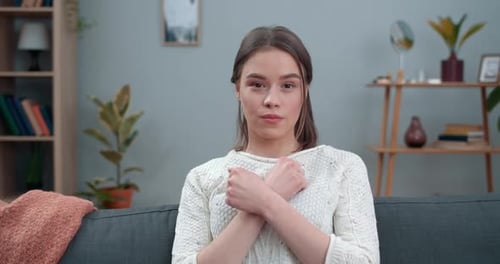 Crop View of Female Person Showing with Deaf-mute Sign Language Peace and Love. Woman Looking To