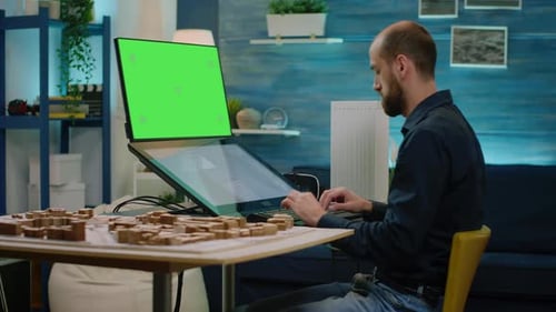 Man Architect Looking at Horizontal Green Screen