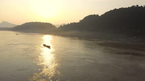 Boat In Mekong River During Sunset