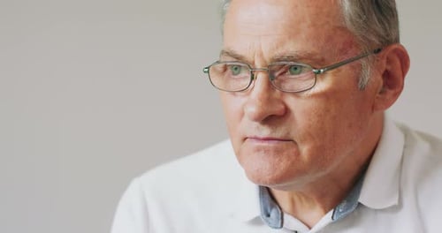 Senior Man Wearing Glasses Close Up