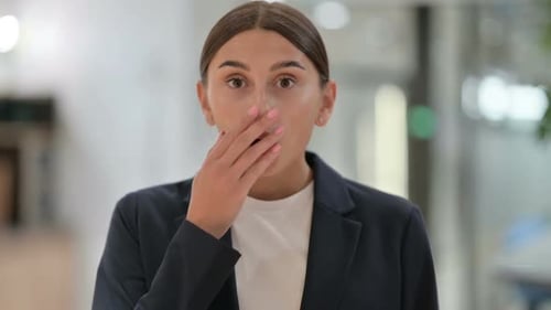 Woman Reacts with Surprise and Concern