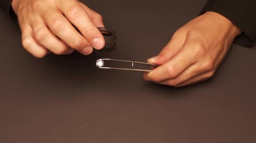 Examining Diamond Through Loupe