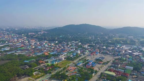 Aerial view of residential buildings in Sri Racha district with sea, Chonburi skyline, Thailand