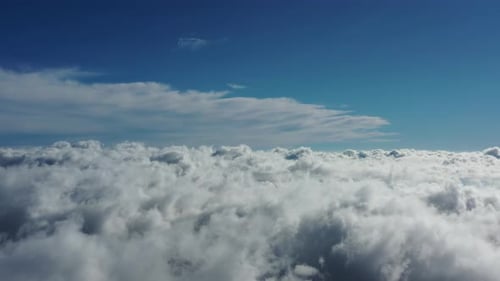 Aerial View of Clouds and Mountains at Sunrise