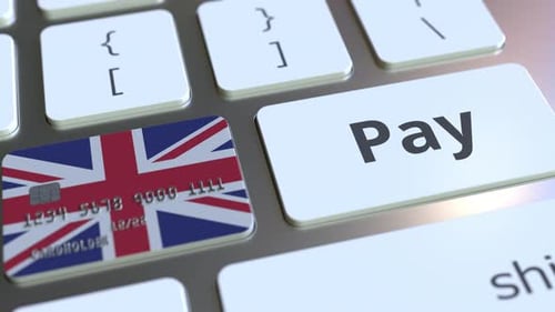 Bank Card with Flag of the United Kingdom As a Key on a Keyboard