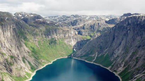 Drone Flying Backward to Reveal a Magnificent View of the Ringedalsvatnet Lake