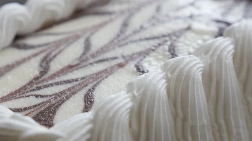 Decorated whipped cream vanila cake on table slow tilting over 4K 3840X2160 UHD video - Vanila and c