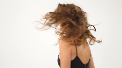 Woman with Wavy Hair Twisting Side to Side