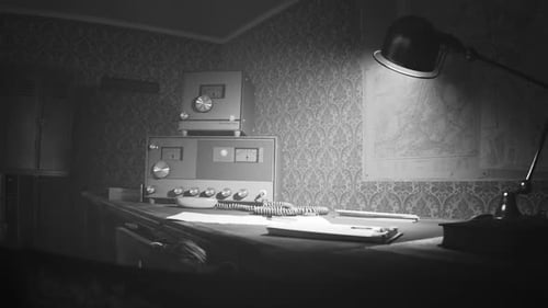 Retro room with vintage radio station standing on the desk under obsolete lamp.