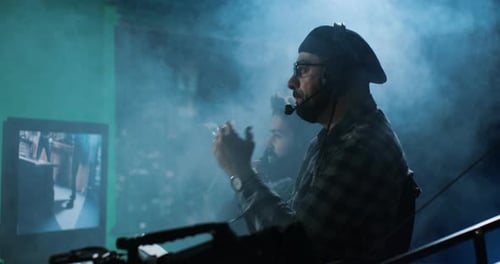 Men Working on Film Production in Studio