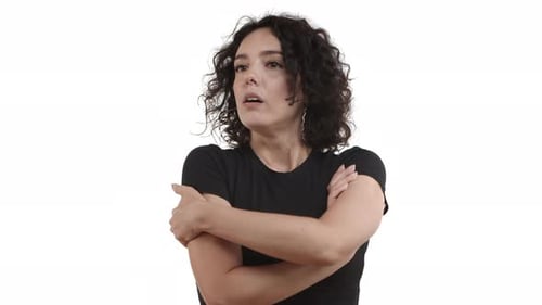 Woman Thinking with Arms Crossed on White Background