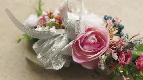 Elegant Pink and White Corsage with Silver Ribbon