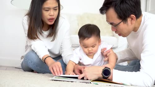Family Reads Picture Book Together Indoors