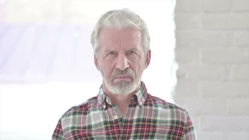 Close Up Portrait of Senior Man with Gray Hair