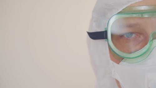 Close Up of Person in Protective Medical Gear