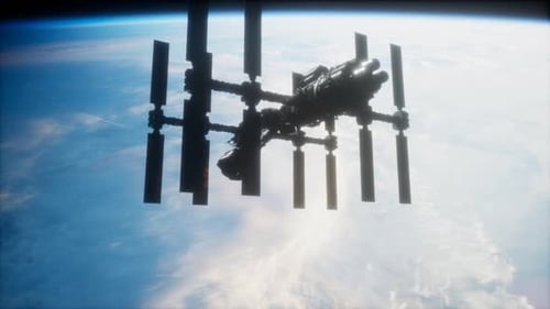 A View of the Earth and a Spaceship. ISS Is Orbiting the Earth