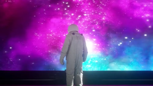 Astronaut Stares at Shimmering Nebula in Futuristic Space Scene