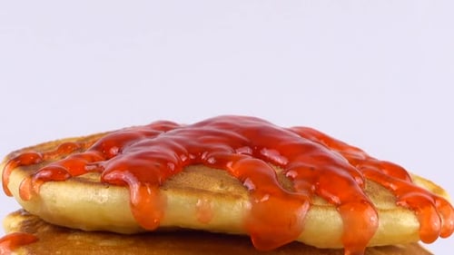 Pancakes Topped with Strawberry Sauce