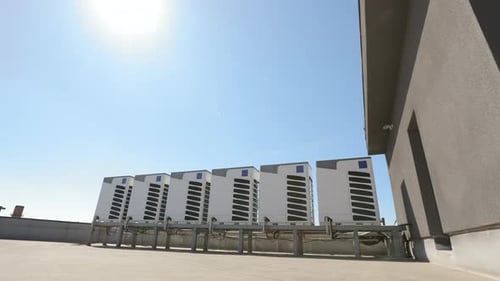 An Air Conditioning System of Six Air Conditioners is Located on the Roof of the Business Center