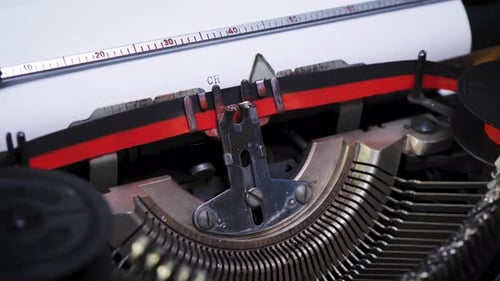 Word Chapter on Paper in an Old Typewriter