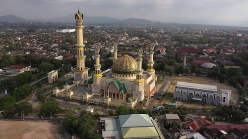 Beautiful Exterior Of Islamic Center Mosque In Mataram, Lombok, Indonesia With Colorful Dome And Tal