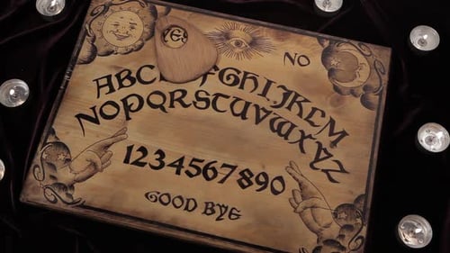 Ouija Board Planchette Moves Mysteriously