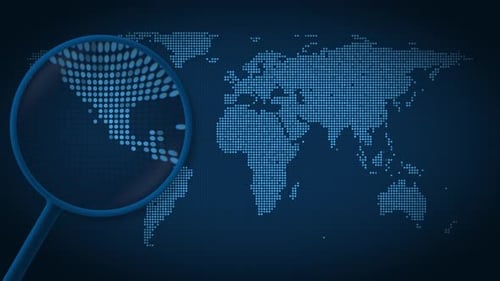 Magnifying Glass Pinpoints Location on Digital World Map