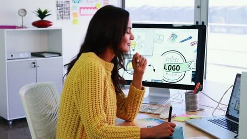 Woman Designing Logo in Modern Office