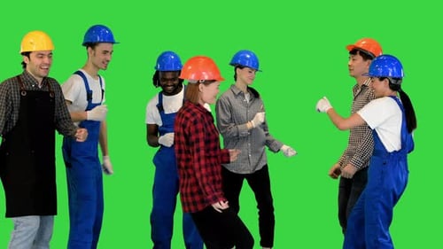 Happy Construction People Dancing in a Circle on a Green Screen Chroma Key