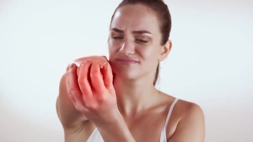 Woman with Pain in the Elbow