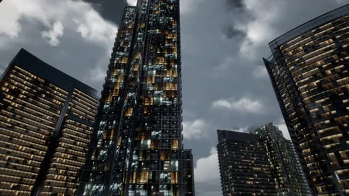 Edificios de oficinas de rascacielos de cristal con cielo oscuro
