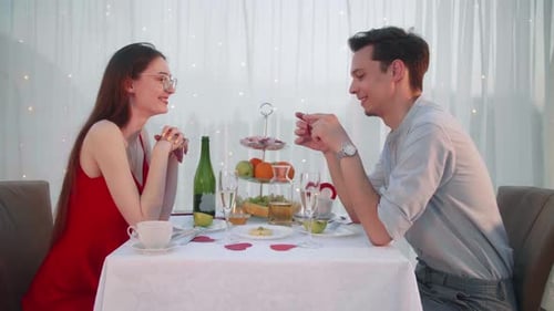 Couple Enjoying Romantic Date with Champagne
