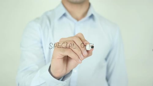 Writing Special Offer With Black Marker on Glass
