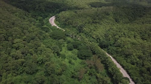 Aerial View Of Countryside Road Passing Through The Mountain Landscape