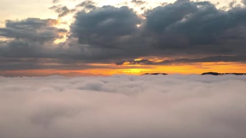 Sunrise Over the Clouds in a Mountain Landscape