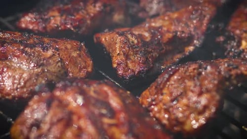 Tasty Ribs Cooking on Barbecue Grill for Summer Outdoor Party